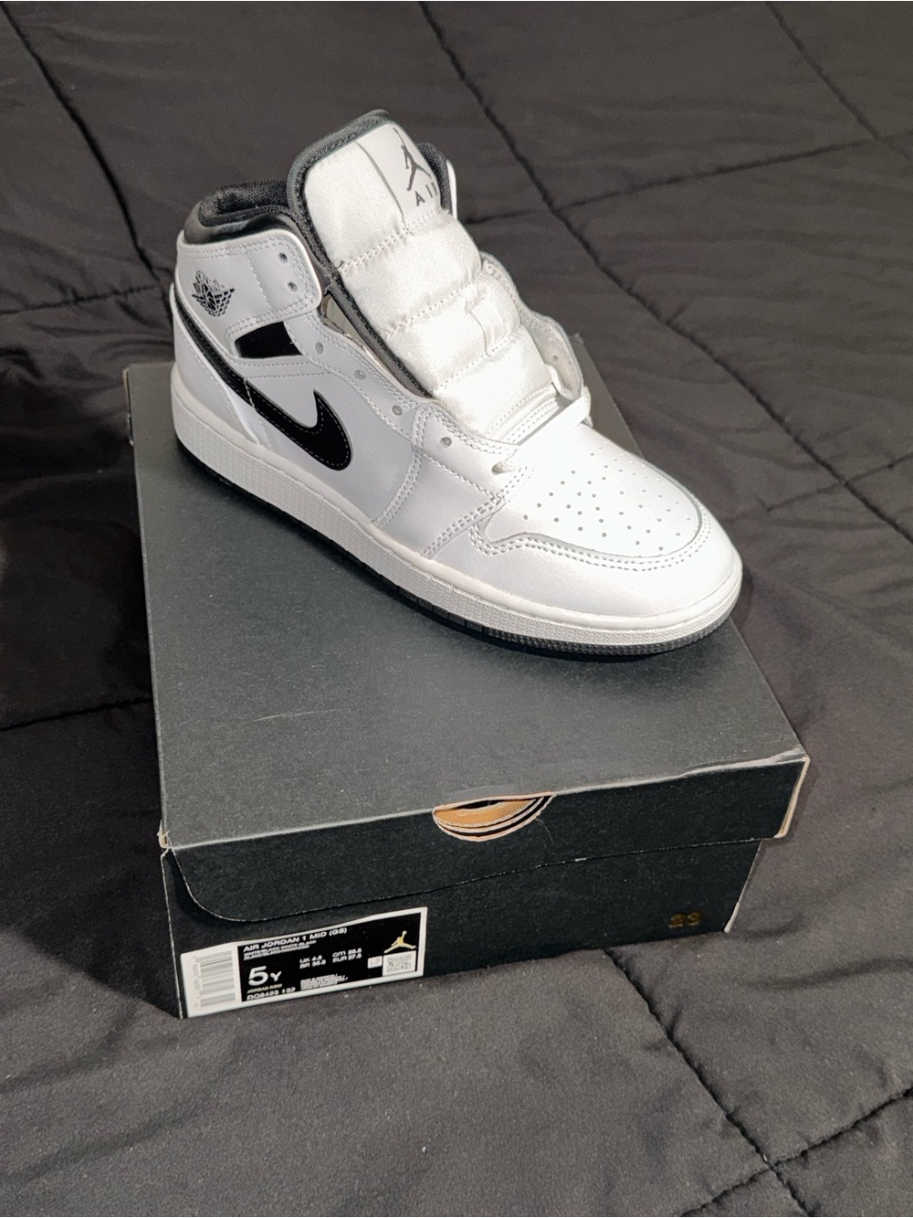 Jordan White and Black Mid-Top Sneakers